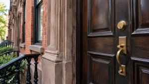 Lock installation Manhattan residential entrance with a visible deadbolt