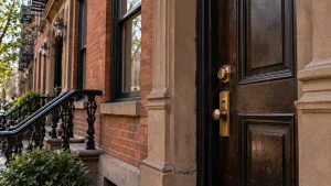 Locksmith Chelsea residential entrance with a visible front door lock